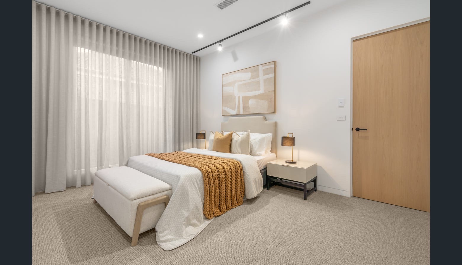 Completed bedroom with neutral carpet